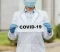 close-up-doctor-holding-covid-sign-2048x1367